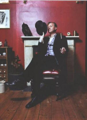 Mark Gatiss, posing at home